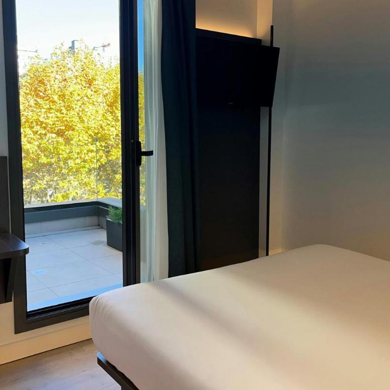 Four Points Flex by Sheraton Madrid Atocha - Standard Zimmer mit Queensize-Bett, Terrasse und Stadtblick - 1