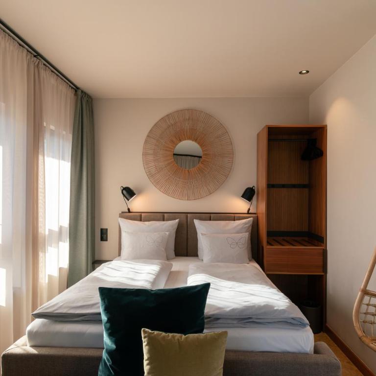 Cocoon Salzburg Hauptbahnhof - Dreibettzimmer - 9