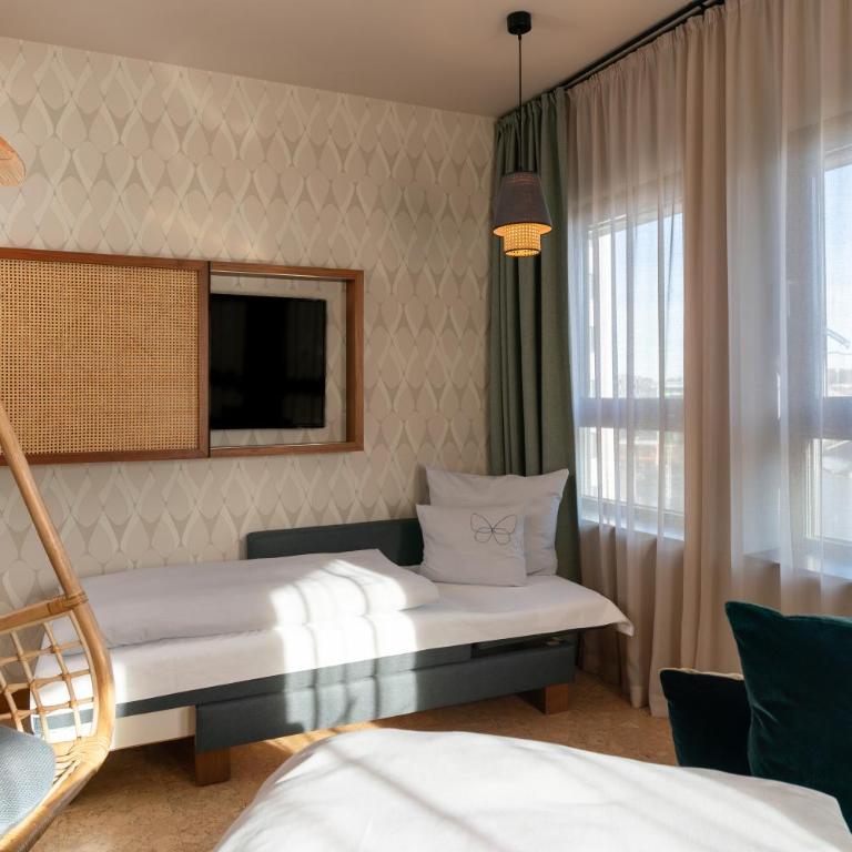 Cocoon Salzburg Hauptbahnhof - Dreibettzimmer - 10