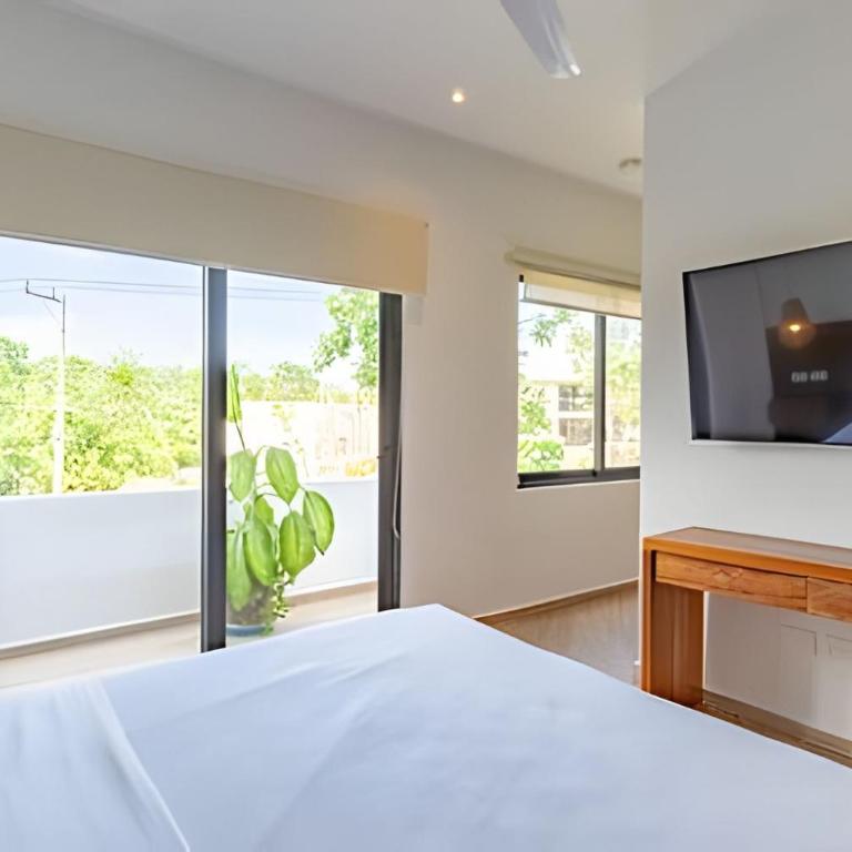 Oasis Yaaxlum 3H - Appartement 3 Chambres avec Balcon - 60