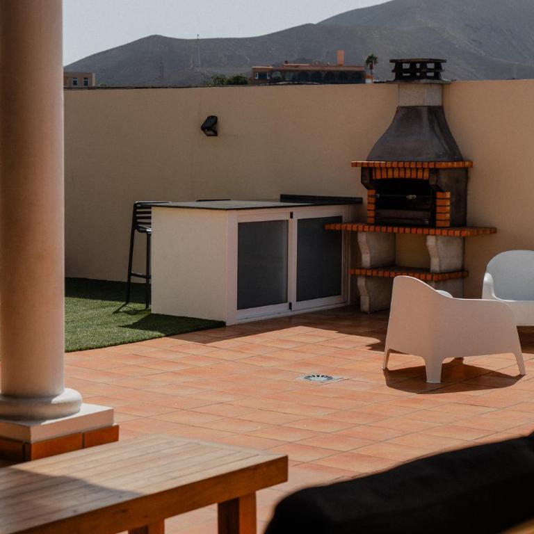 Moderne villa met verwarmd zwembad in Corralejo - Three-Bedroom Villa - 47