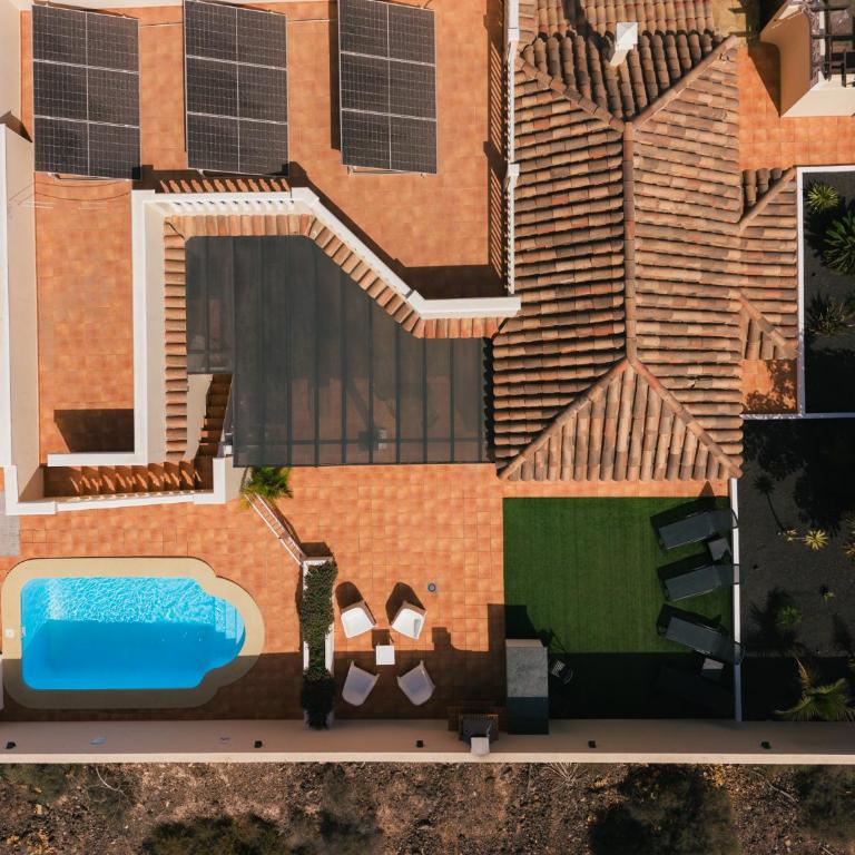 Moderne villa met verwarmd zwembad in Corralejo - Three-Bedroom Villa - 54