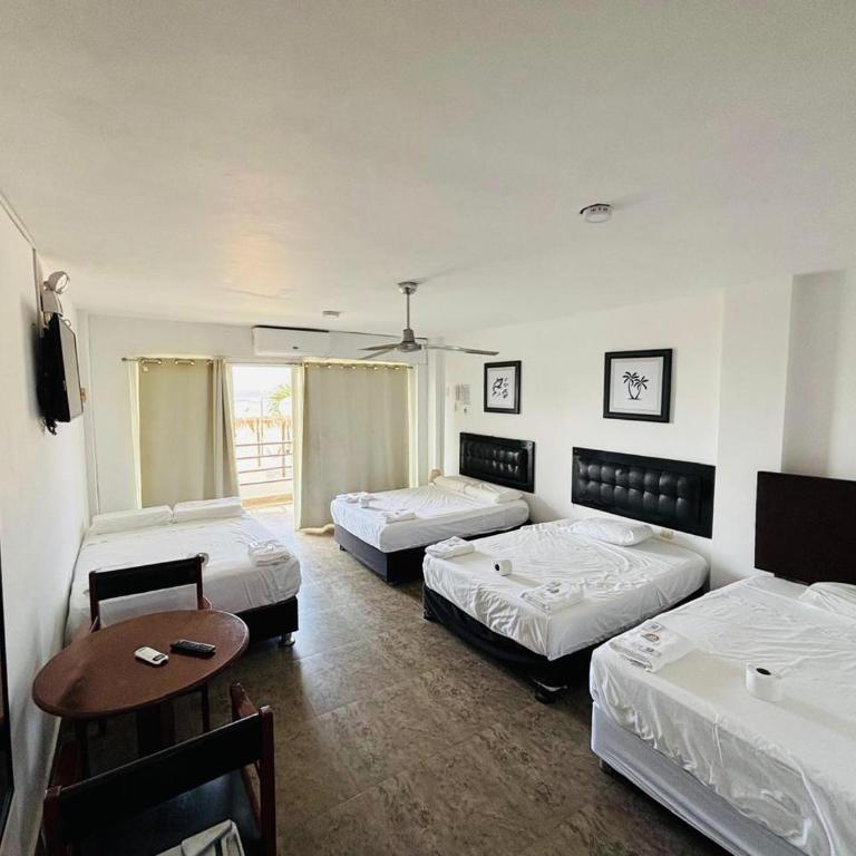 Hotel Las Cabañas de Bonanza - Quadruple Room with Sea View - 10