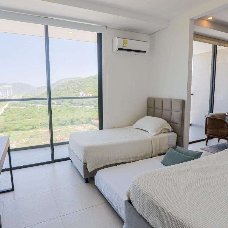 Fantástico Apartamento Santa Marta Pozos Colorados - Family Room - 16
