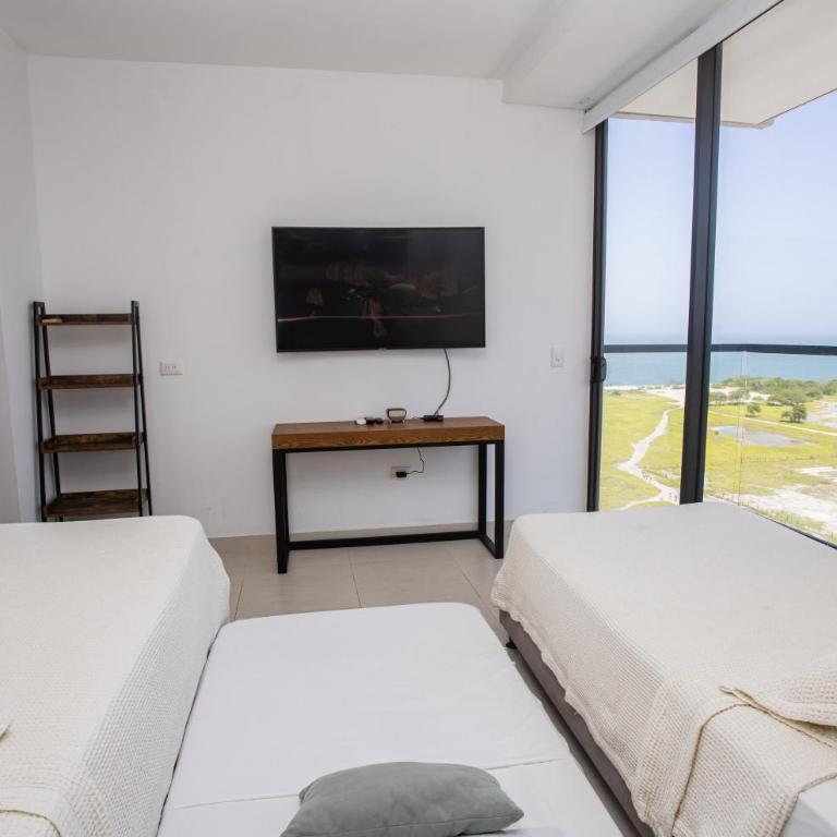 Fantástico Apartamento Santa Marta Pozos Colorados - Family Room - 15