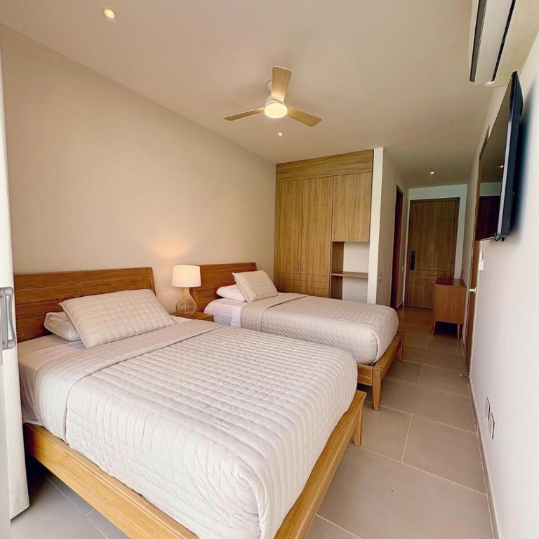 Jacuzzi privado con vista a la laguna de Baía Kristal - Three-Bedroom Apartment - 7