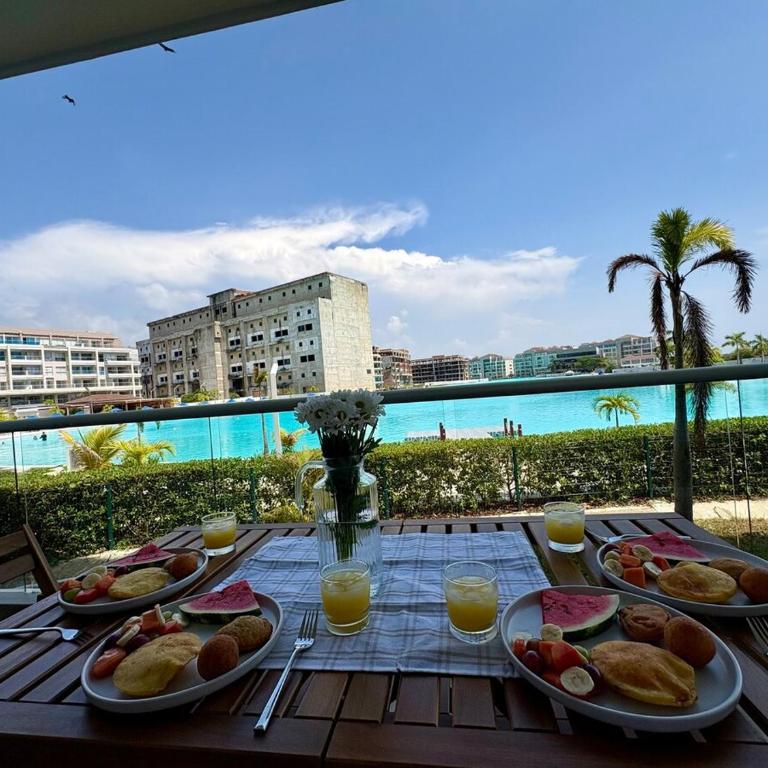 Jacuzzi privado con vista a la laguna de Baía Kristal - Three-Bedroom Apartment - 10