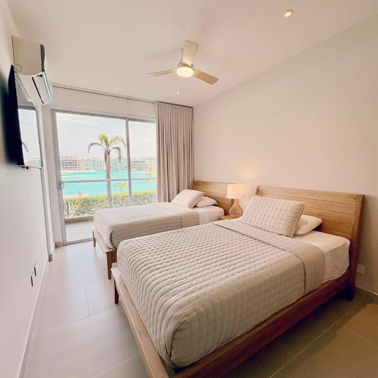 Jacuzzi privado con vista a la laguna de Baía Kristal - Three-Bedroom Apartment - 13