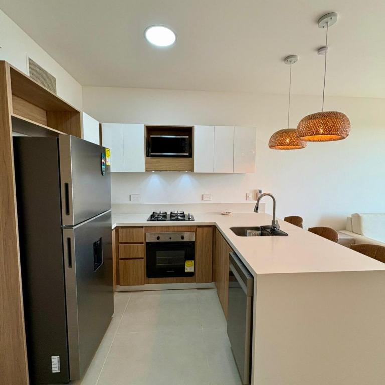 Pure Caribbean flair in a secured family resort - One-Bedroom Apartment - 11