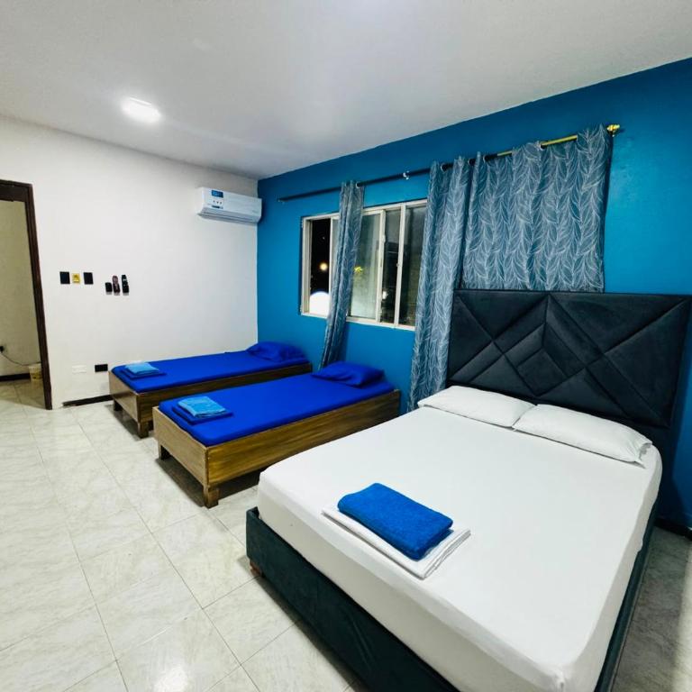 CASA HOTEL ASL HOME CALI NORTE - Sector Santa Mónica Residencial - Habitación Doble con baño privado externo - 2 camas - 1