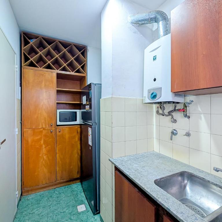 Top ubicación de Rosario centro - 1 dormitorio con balcón y todas las comodidaes - Apartamento de 1 dormitorio - 12