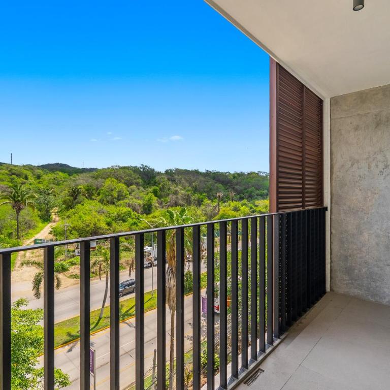 1BR Bucerías condo with pool, gym, balcony, WiFi, and beach views - Maison de Vacances - 36