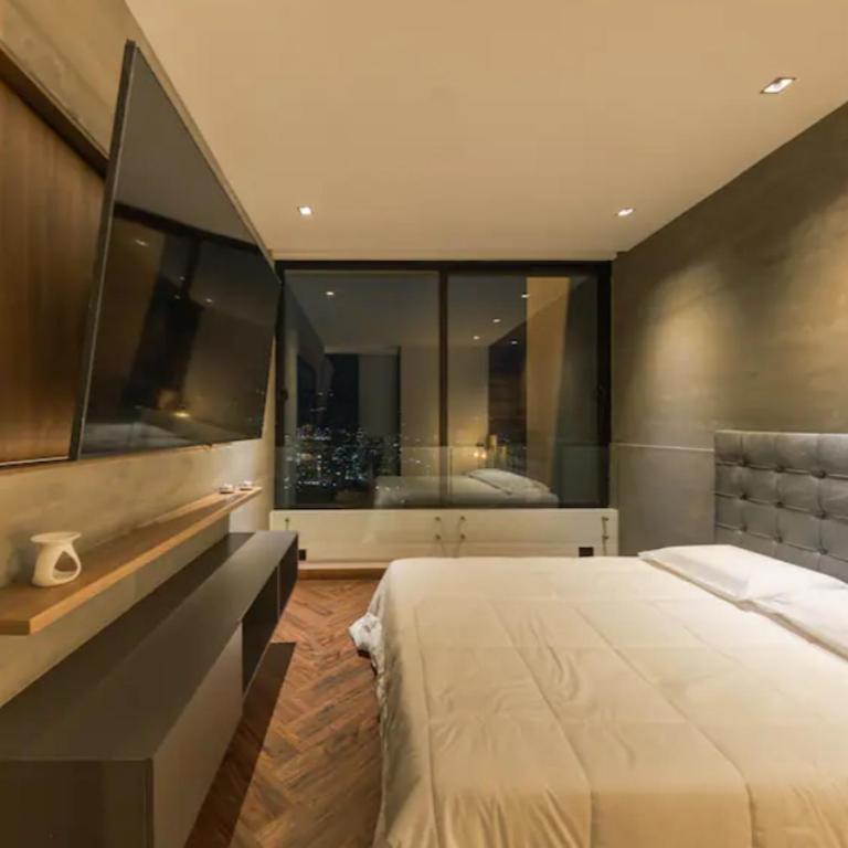 Apartamento con terraza y jacuzzi, espectacular vista de Medellín, Poblado - Apartamento - 14