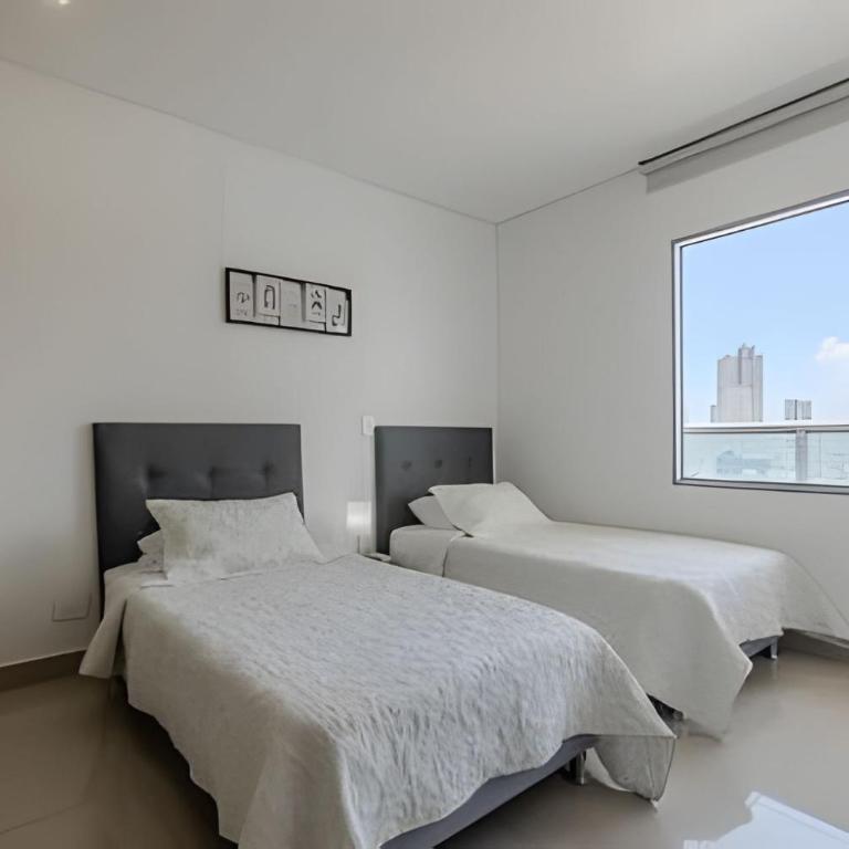 Exclusivo apartamento con vista a la bahía piso 22 - Three-Bedroom Premium Apartment with Balcony - 21