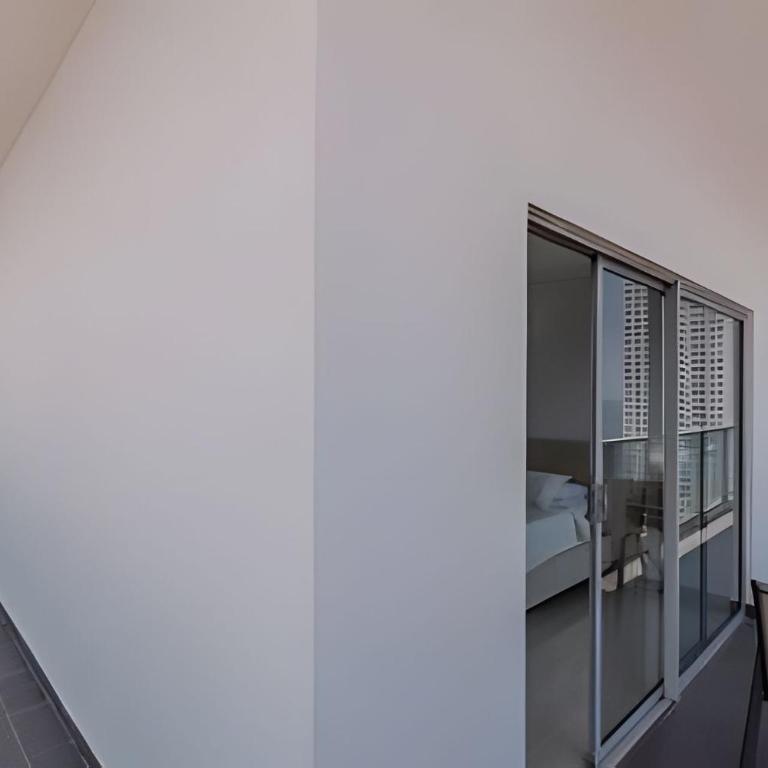 Exclusivo apartamento con vista a la bahía piso 22 - Three-Bedroom Premium Apartment with Balcony - 36
