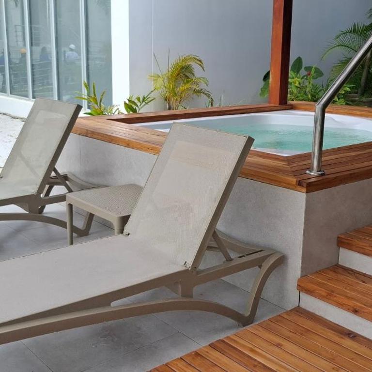 Pure Caribbean flair in a secured family resort - One-Bedroom Apartment - 55