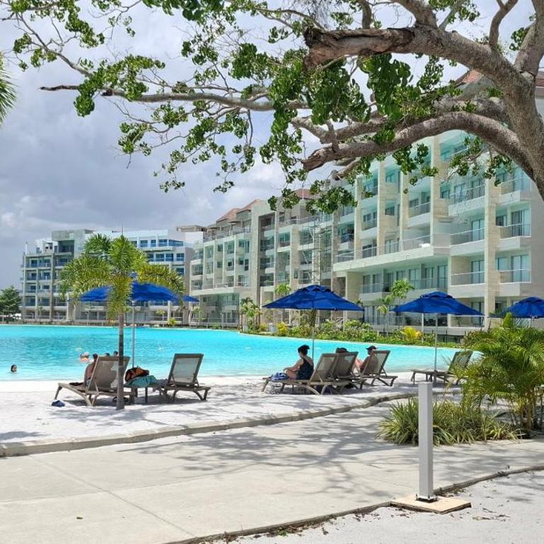 Pure Caribbean flair in a secured family resort - One-Bedroom Apartment - 6