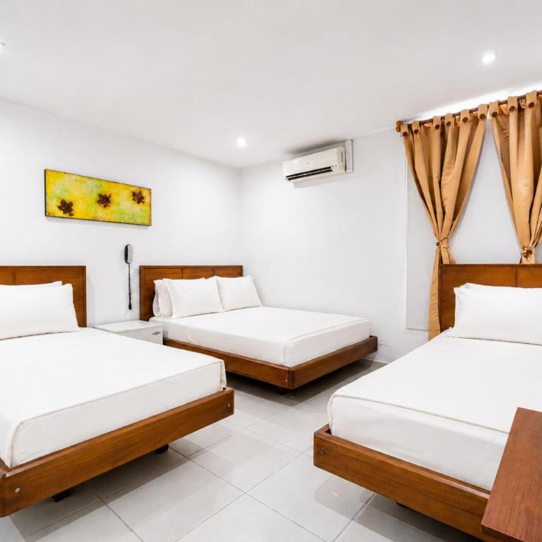 Casa Serena Hotel Boutique - Classic Quadruple Room - 1