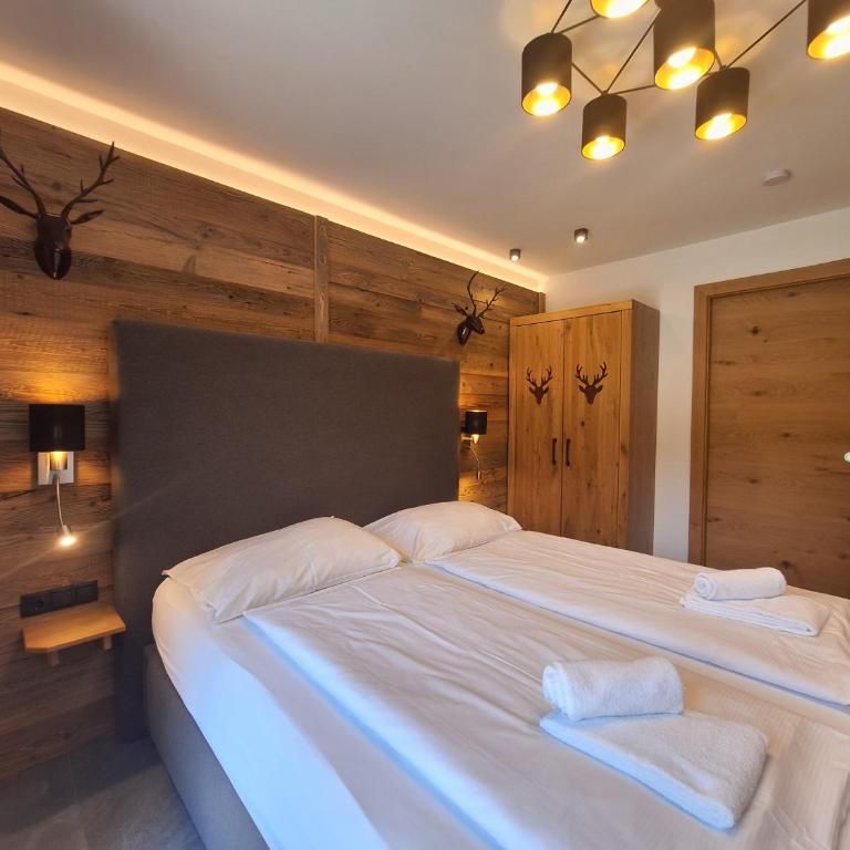 Mimis Bergnest Steinbock Lodges - Deluxe Apartment mit 2 Schlafzimmern und Gartenblick - 3