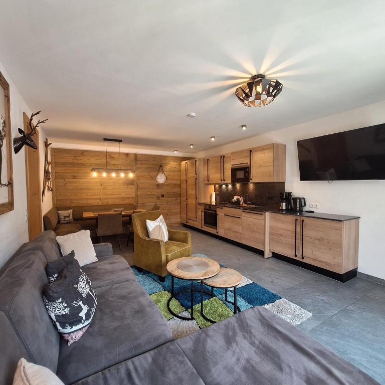 Mimis Bergnest Steinbock Lodges - Deluxe Apartment mit 2 Schlafzimmern und Gartenblick - 19