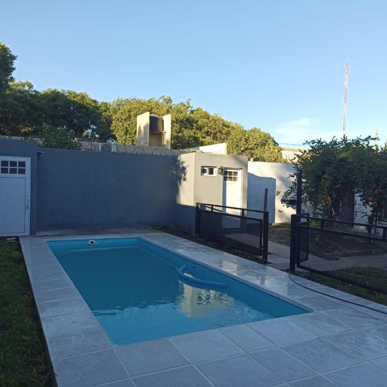 Alquileres Brun - Casa con Pileta - Four-Bedroom House - 15