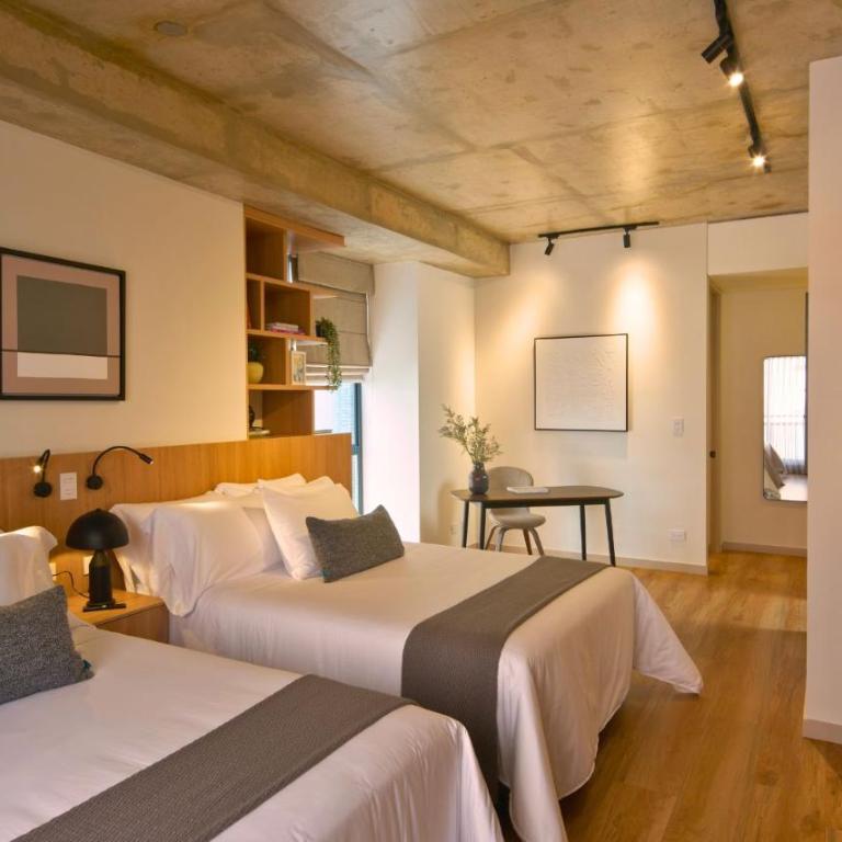 Kubik Living 8i8 - Habitación Deluxe con 2 camas grandes - 6