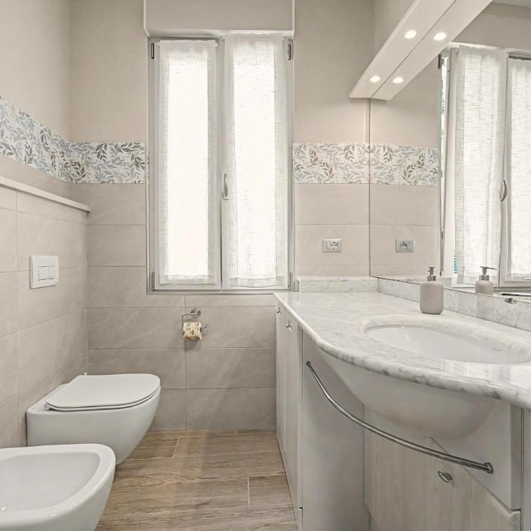 Casa Vacanza Preziosa - Appartamento con 2 Camere da Letto e Vista Lago - 12
