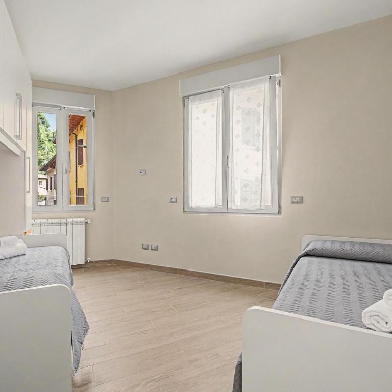 Casa Vacanza Preziosa - Appartamento con 2 Camere da Letto e Vista Lago - 17