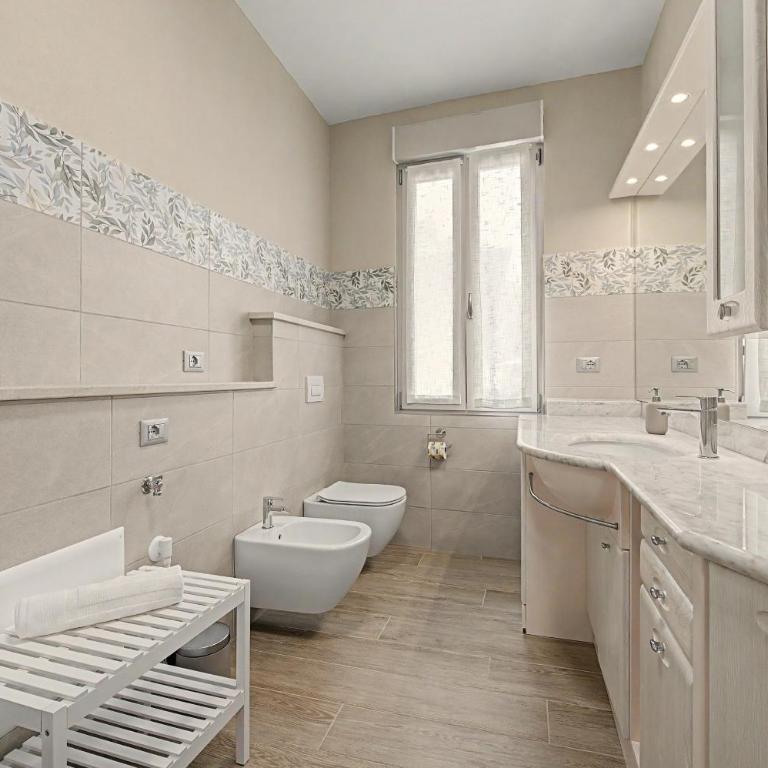 Casa Vacanza Preziosa - Appartamento con 2 Camere da Letto e Vista Lago - 11