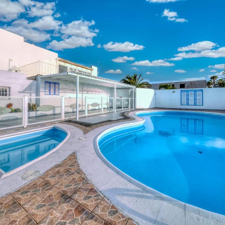 Casa Picon en Puerto del Carmen, con terraza, vistas al mar, piscina y junto a la playa - Apartment mit 2 Schlafzimmern - 35