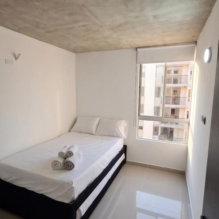Apartamento Completo - Piscina - AC - Parqueadero - Gimnasio - Three-Bedroom Apartment with Balcony - 15