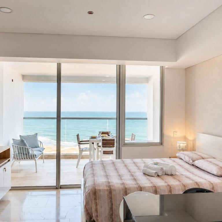 Sea View Apartment Suite with Pool, 3 min to the Airport - One-Bedroom Apartment - 12