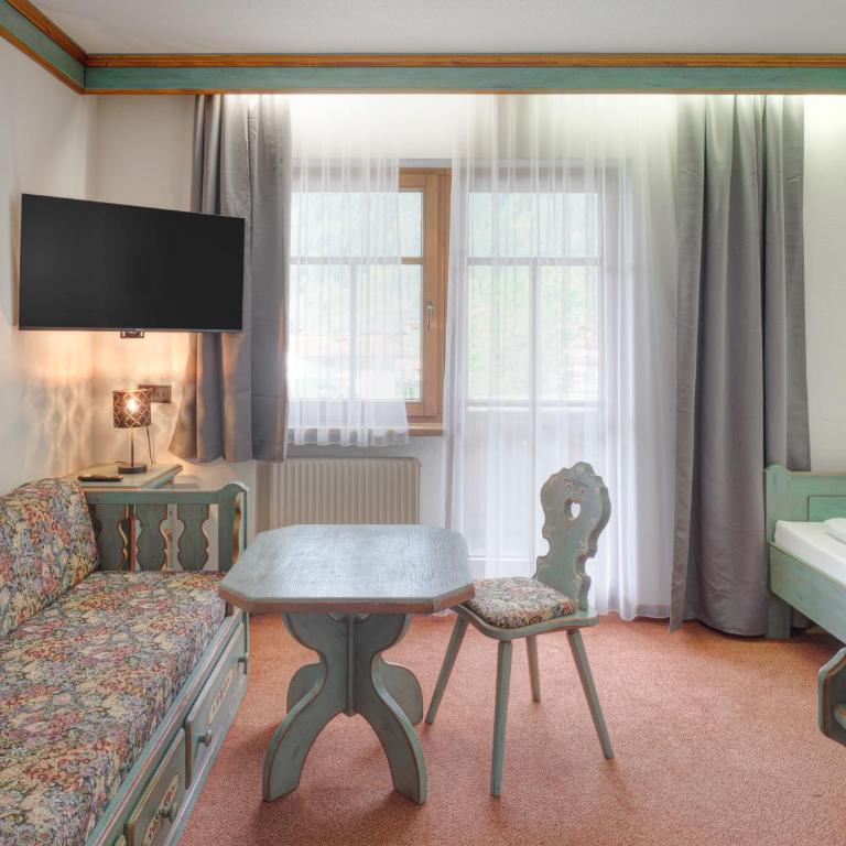 Center Rooms & Apartments - Einzelzimmer mit Bergblick - 6