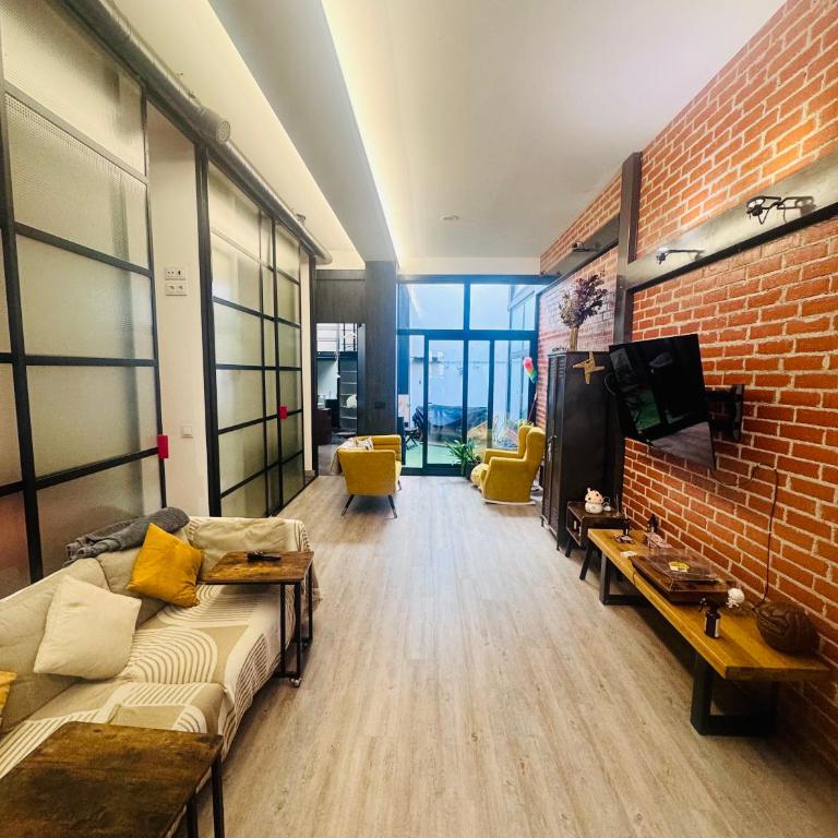Large Modern Industrial Loft Close to Beaches - Three-Bedroom Apartment - 1