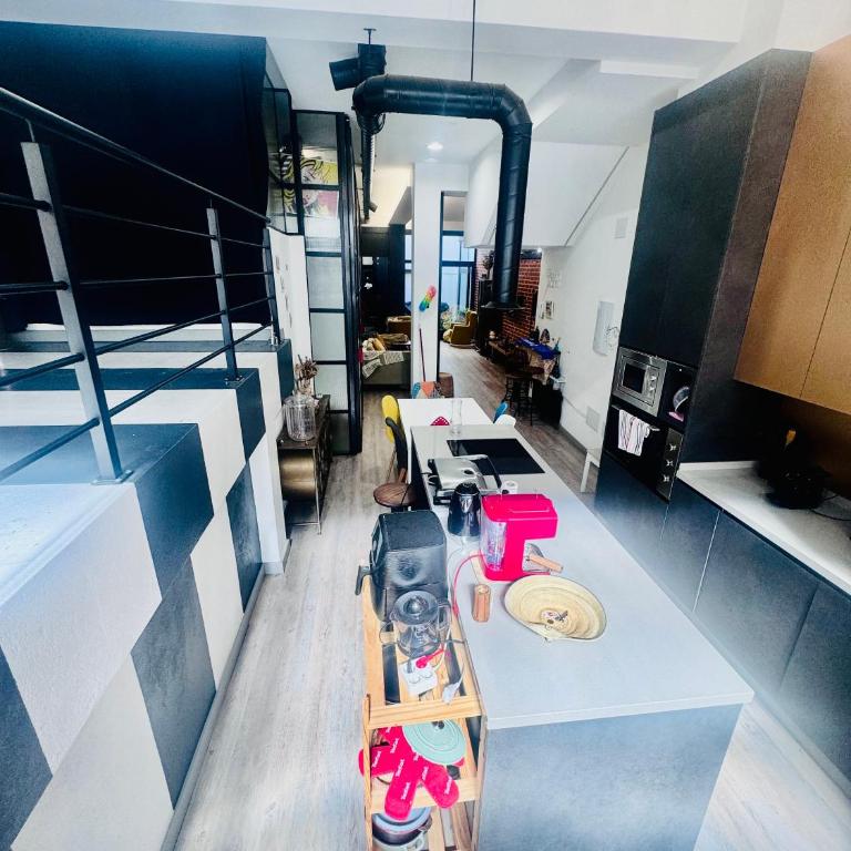 Large Modern Industrial Loft Close to Beaches - Three-Bedroom Apartment - 16