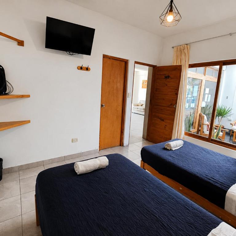Ravenala Paracas Hostel & Apartment - Habitación Doble - 2 camas - 6