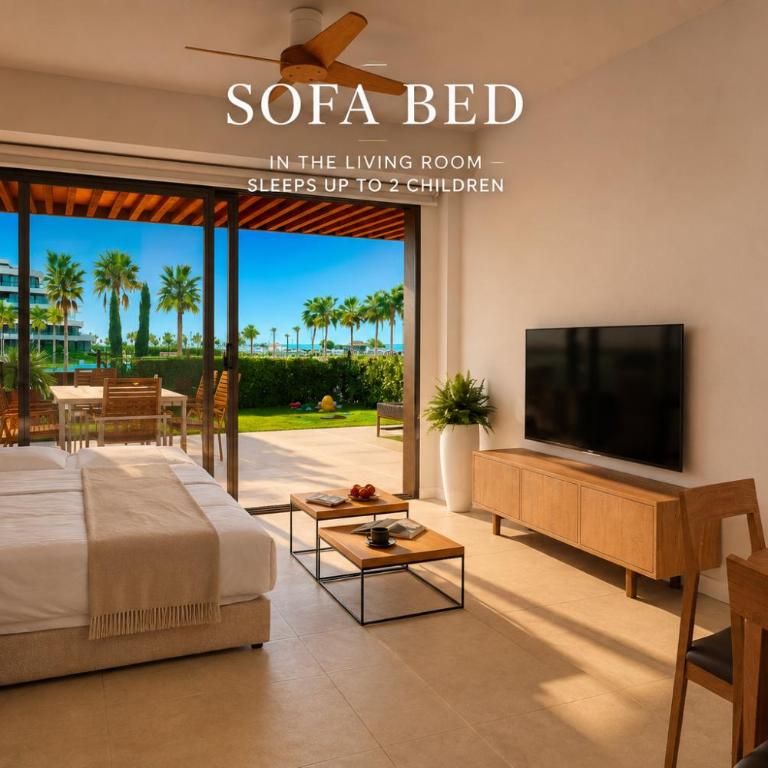 LolaBeachfront - Indoor Heated Pool & Spa - Premium Gym - Private Garden - 5 min Train to Airport - Deluxe Apartment mit 1 Schlafzimmer und Gartenblick - 26