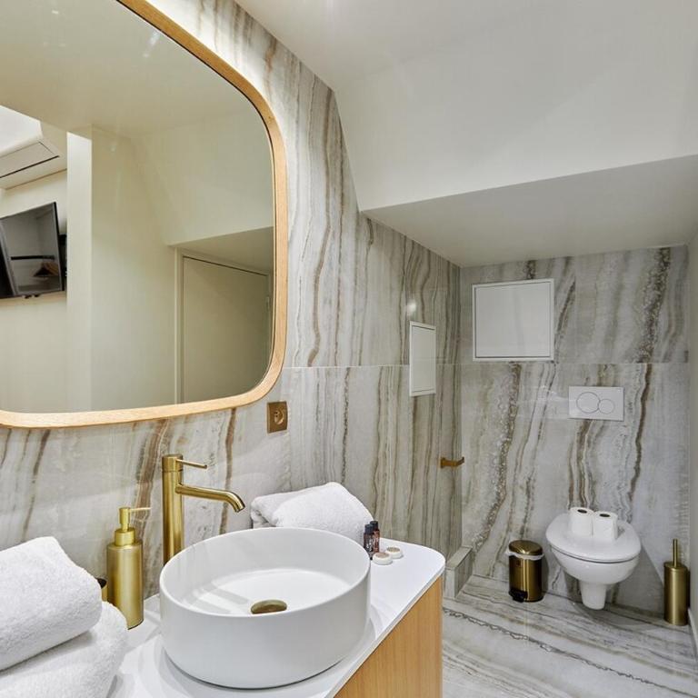 Apartment Le Marais place des Vosges by Studio prestige - Appartement - 11