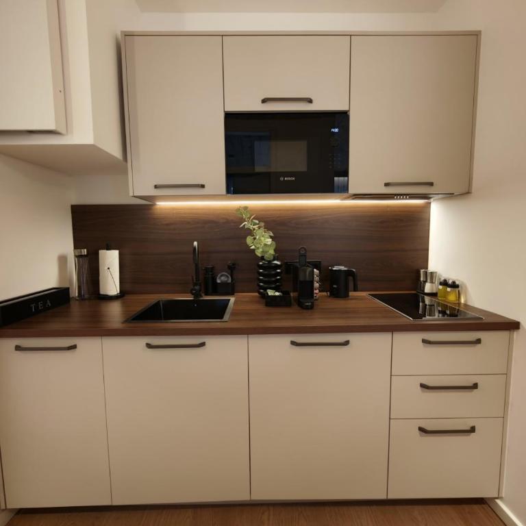 Homely Stay City Apartments - Deluxe Apartment mit 1 Schlafzimmer - 8