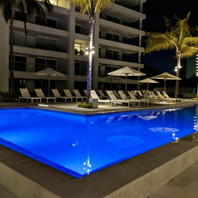 Luxury 2BR Beachfront Escape Stunning Views from Private Balconies - Two-Bedroom Apartment - 29