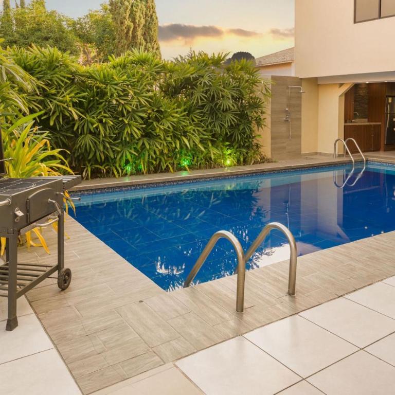 EXECUTIVE SUITE Piscina & Parking Privado - Apartamento de 1 dormitorio - 14