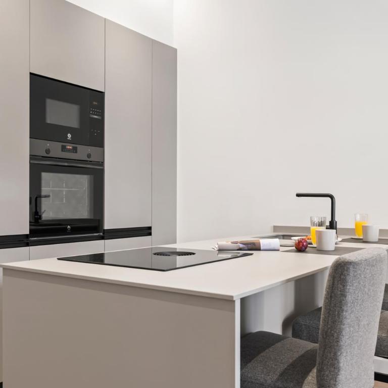 Espectacular apartamento en el centro, a 3 min de la playa de San Lorenzo - Apartamento de 2 dormitorios - 8