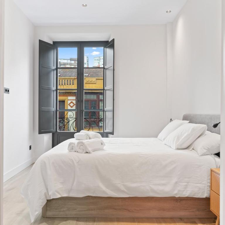 Espectacular apartamento en el centro, a 3 min de la playa de San Lorenzo - Apartamento de 2 dormitorios - 11