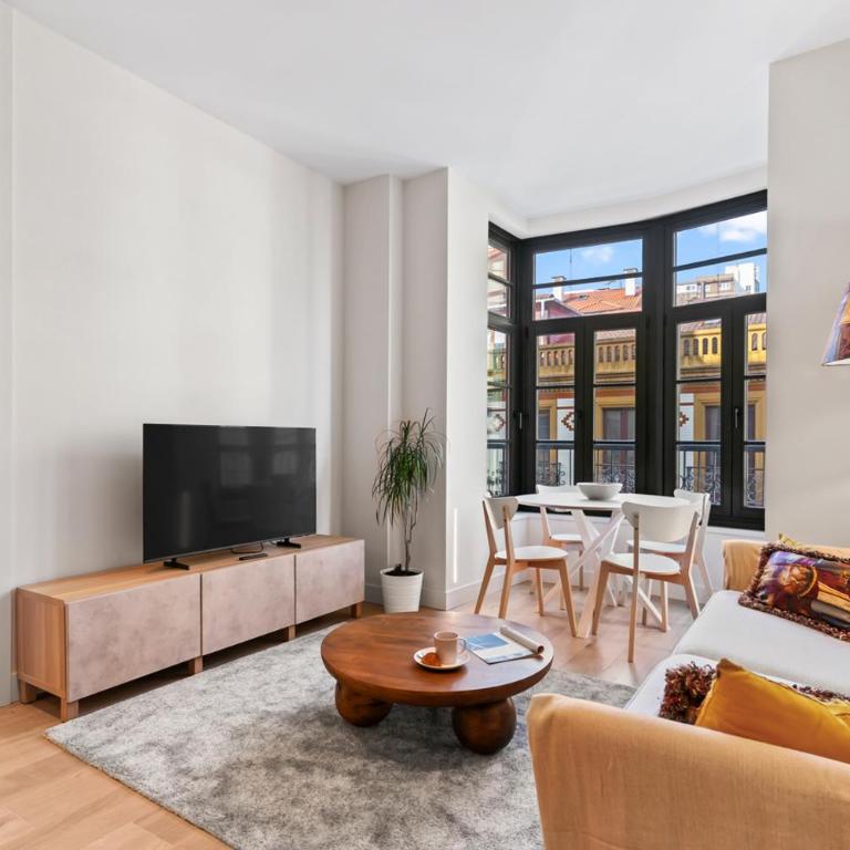 Espectacular apartamento en el centro, a 3 min de la playa de San Lorenzo - Apartamento de 2 dormitorios - 2