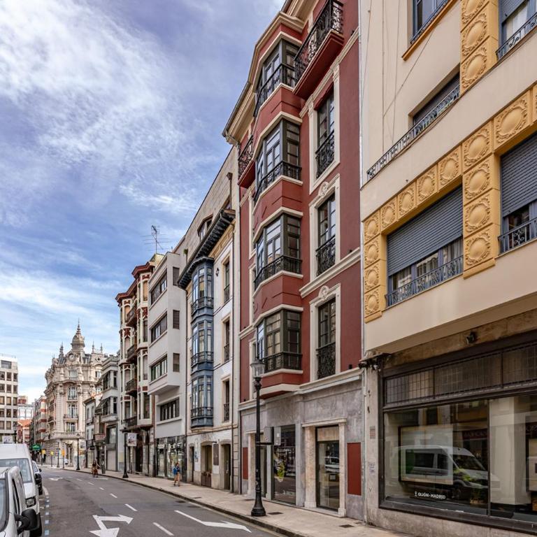 Espectacular apartamento en el centro, a 3 min de la playa de San Lorenzo - Apartamento de 2 dormitorios - 24