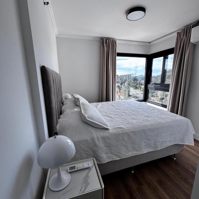 Apartamento de 2 dormitorios,4 Personas, Edificio Sea Garden,zona CANTEGRIL 2 Dormitorios - Apartamento de 2 dormitorios con vistas al jardín - 12