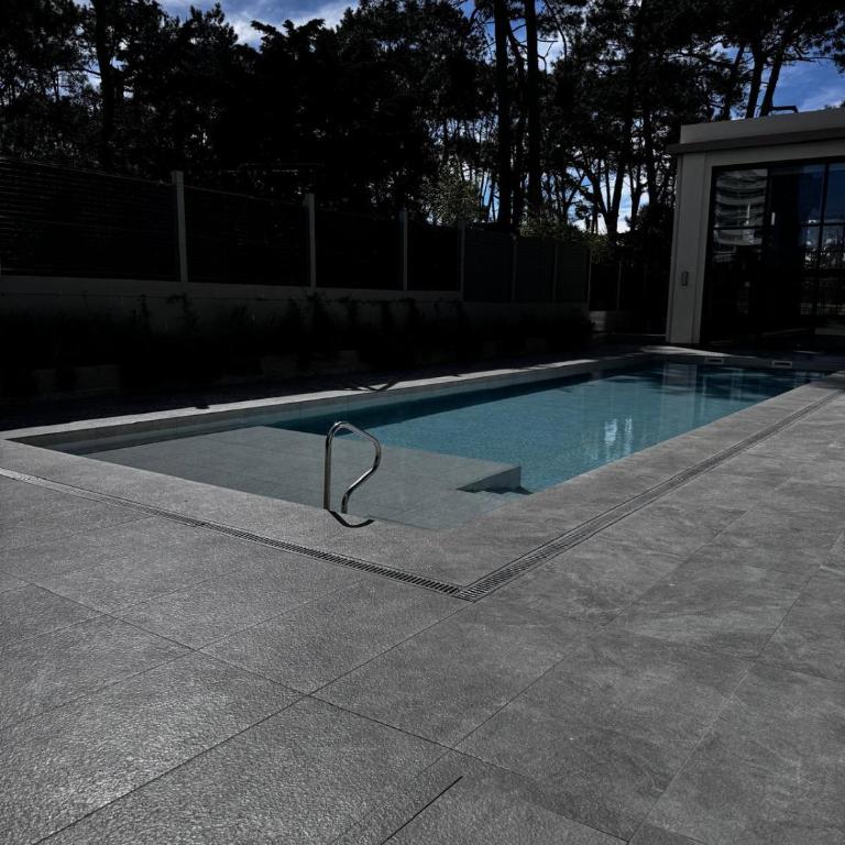 Apartamento de 2 dormitorios,4 Personas, Edificio Sea Garden,zona CANTEGRIL 2 Dormitorios - Apartamento de 2 dormitorios con vistas al jardín - 16