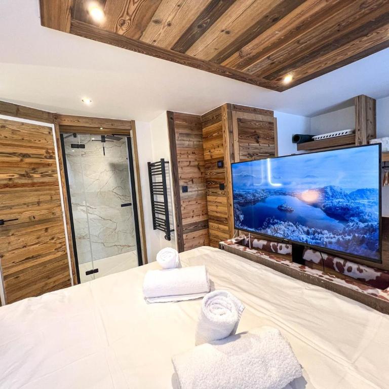 Chalet de luxe aux Gets - 4 chambres pour 9 personnes avec jacuzzi et Wi-Fi - FR-1-671-314 - Chalet - 7