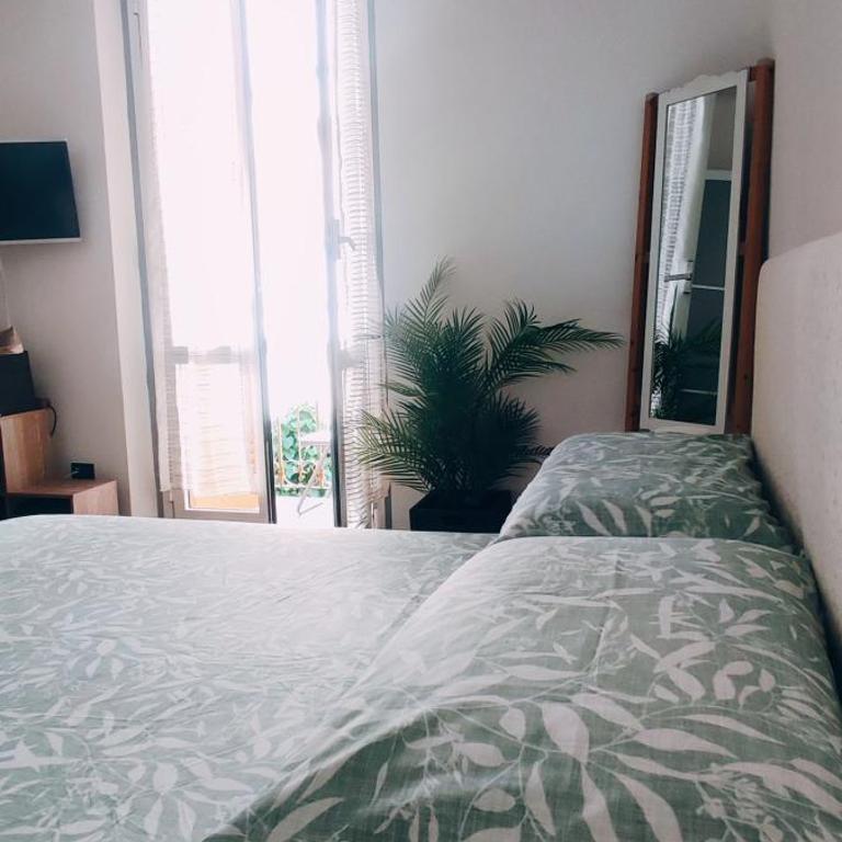 Casa Vitto Spazioso Bilocale, Air Conditioning , Wi-Fi, near Train Station and Airport - One-Bedroom Apartment with Balcony - 1
