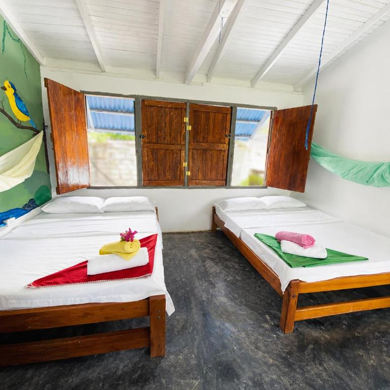 Cabañas Los Almendros - Habitación Triple con vistas al jardín - 1